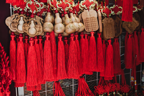 colourful traditional souvenirs in china market - Foto, imagen