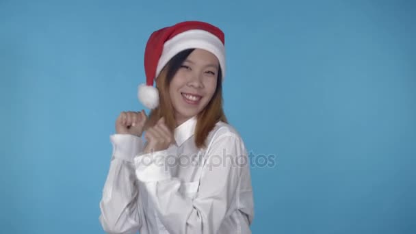 beautiful korean female celebrating christmas - Felvétel, videó