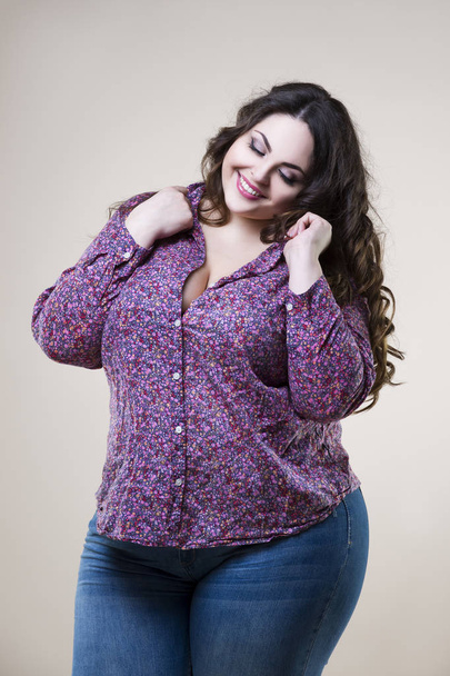 Happy plus size fashion model, sexy fat woman on beige background - Photo, Image