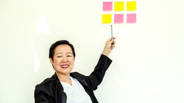Asian senior business woman happy smiling expression face - 写真・画像