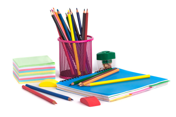colored pencils in the basket, Eraser and pencil sharpener on wh - Φωτογραφία, εικόνα