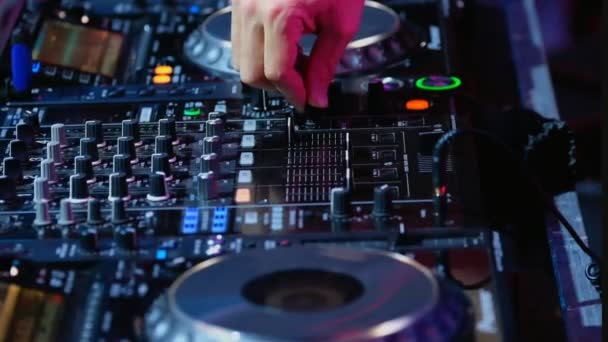 DJ plays mix on controller at a disco - Footage, Video