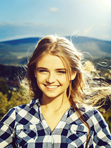 Pretty girl smiles outdoors - Foto, Imagem