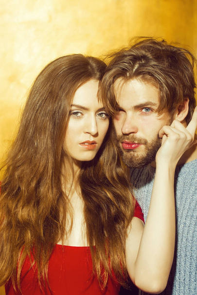 Young couple of pretty girl and bearded man - Фото, зображення