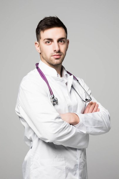 Smiling medical doctor with stethoscope. isolated over white background - Photo, Image