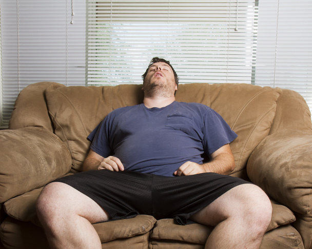 жирний чоловік заснув
 - Фото, зображення