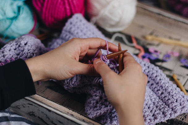 Woman hands knitting with purple wool - Zdjęcie, obraz
