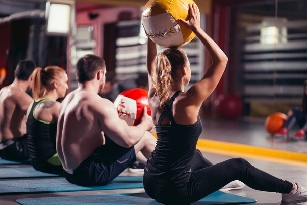 workout group woman and man at gym - Foto, Bild