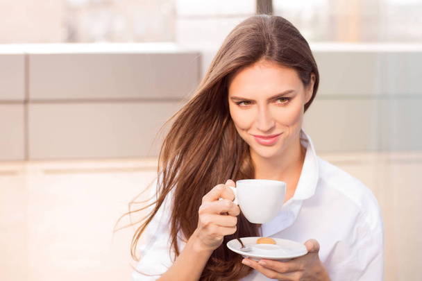 Beautiful Woman With Cup of Tea or Coffee - 写真・画像