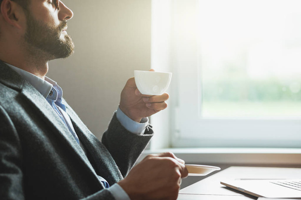 businessman  holding cup of coffee - Фото, зображення