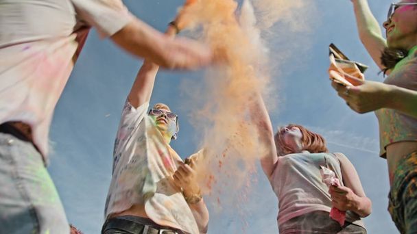 Young People Smearing Each Other with Powder Paint - Photo, Image