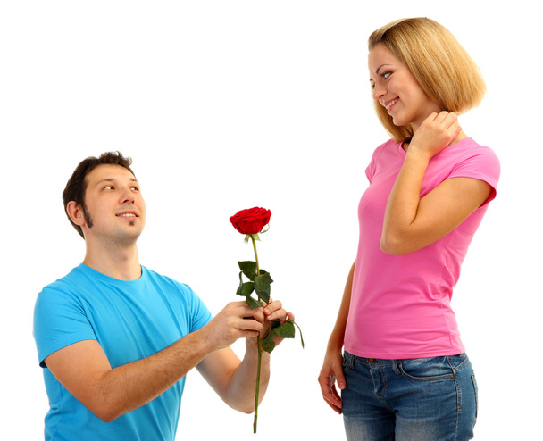 Loving man giving woman rose isolated on white - Fotó, kép