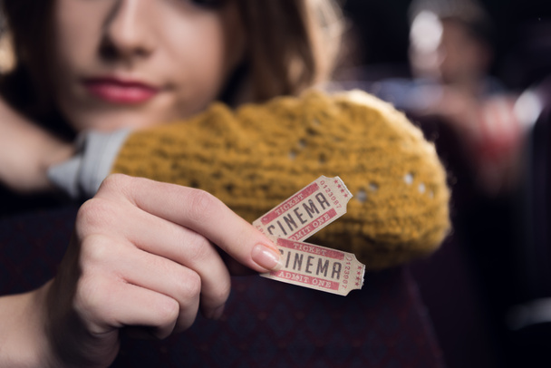 cropped view of woman holding two cinema tickets - Photo, Image