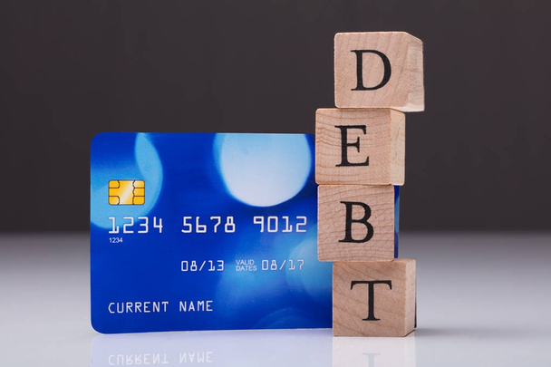 Debt Word On Wooden Block - Fotó, kép