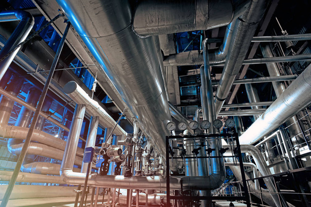 Equipment, cables and piping as found inside of a modern industr - Photo, Image