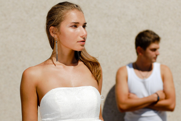 Young couple looking in opposite directions - Fotoğraf, Görsel