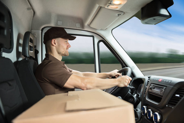 Delivery Man Sitting Inside Van  - Photo, Image