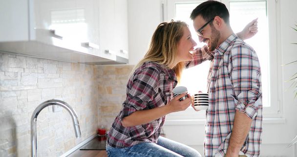 couple in love at home drinking coffee - Fotoğraf, Görsel