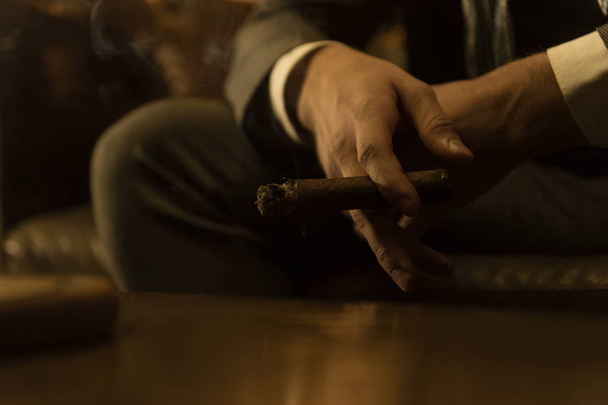 man is smoking a cigar - Φωτογραφία, εικόνα