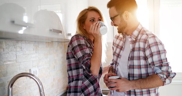 couple in love at home drinking coffee - Фото, изображение