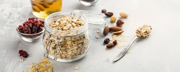 Ingredients for homemade oatmeal granola - Fotografie, Obrázek
