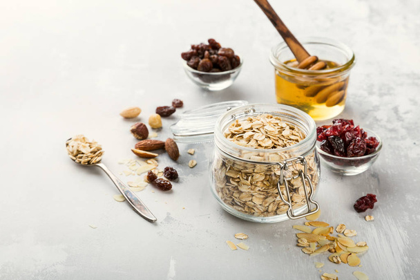 Ingredients for homemade oatmeal granola - Photo, Image