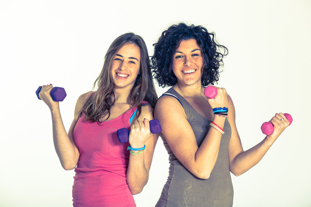 Two Women with Light Weights at Gym - Valokuva, kuva