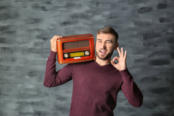 Young man listening to radio  - Foto, Bild