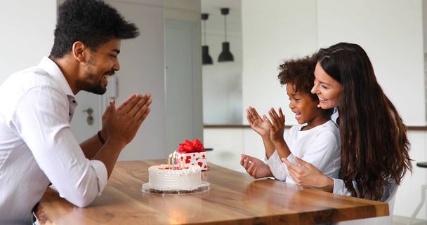 family celebrating birthday of child - Фото, зображення