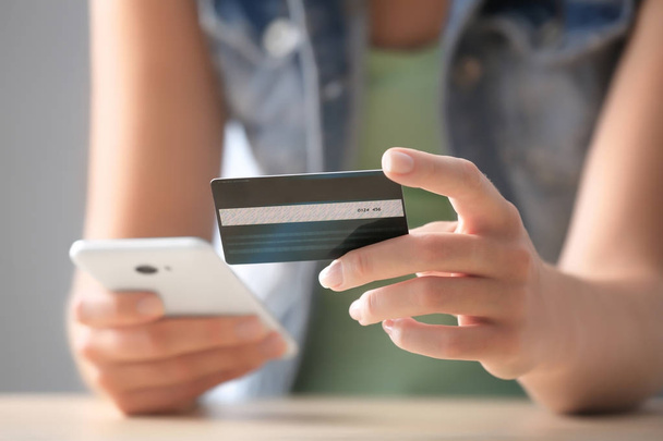  woman with credit card and mobile phone - Photo, Image