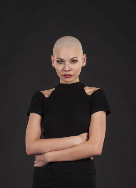 Emotional portrait of girl shaved bald. - Фото, изображение