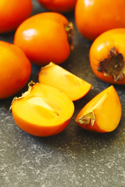 Delicious fresh persimmon fruits - Valokuva, kuva