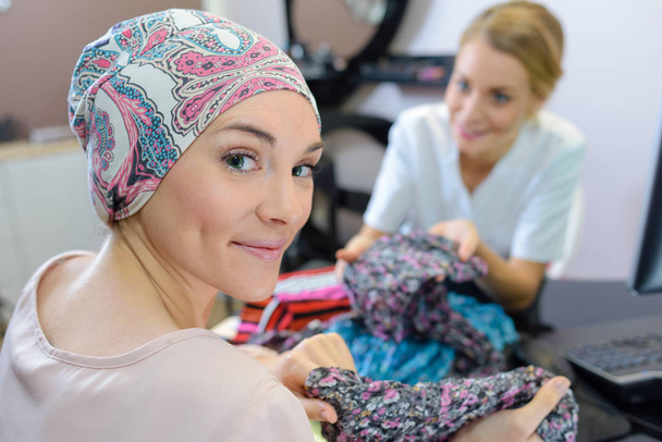 woman trying head scarves - Photo, Image