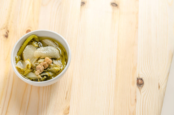 Chinese vegetable stew, mixture of vegetables and pork on wooden background - Foto, Imagem