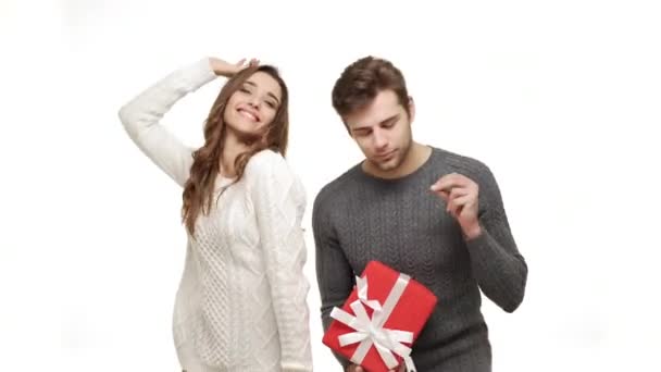 4k young couple in sweaters enjoy dancing celebrate for christmas fun together feeling attraction. - Video