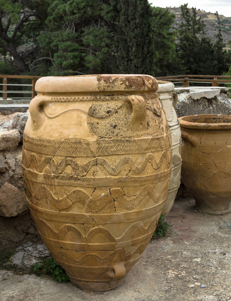 CRETE, GRECE - November, 2017: Ancient amphorae at Knossos palace, Crete
 - Фото, изображение