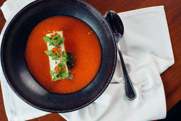 Red lentil soup on dark stone backgroud, top view - Zdjęcie, obraz
