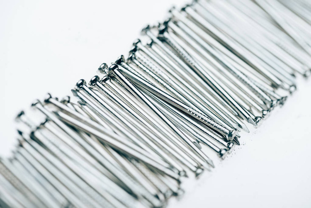 close up view of metal framing nails isolated on white - Φωτογραφία, εικόνα