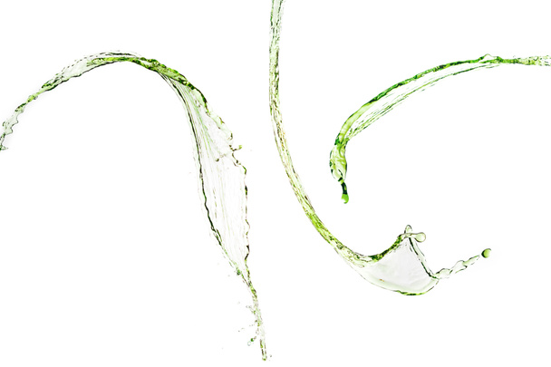 salpicos de água verde isolado no branco
 - Foto, Imagem
