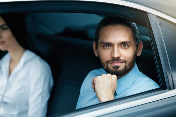 Portrait Of Business People In Car. - Photo, Image