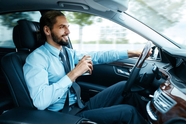 Portrait Of Business Man Driving Car - Foto, imagen