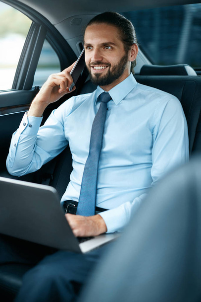 Business Man In Car Calling On Phone While Going To Work - Фото, изображение