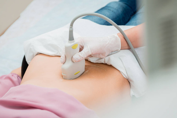 Ultrasound scanner in the hands of a doctor. Diagnostics. Sonography. - Valokuva, kuva