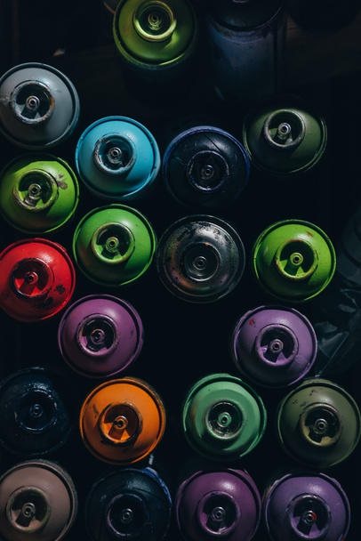 top view of cans with colorful aerosol paint  - Photo, Image