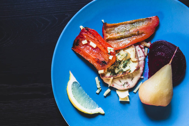 Vegetarian dishes with pears on plates - Valokuva, kuva