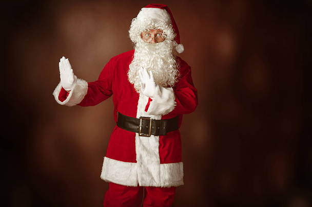 Portrait of Man in Santa Claus Costume - Foto, imagen