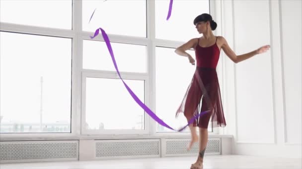 Woman performing dance with ribbon - Felvétel, videó