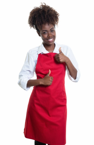 African american waitress with red apron has fun at work - Foto, Imagem