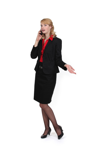 Businesswoman talking on her cell - Fotó, kép
