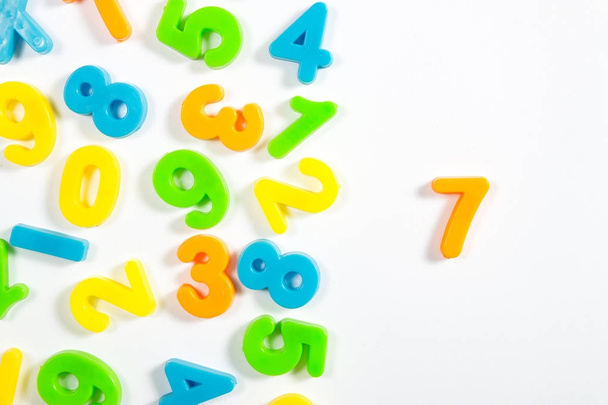 colored seven number and math background - Photo, Image